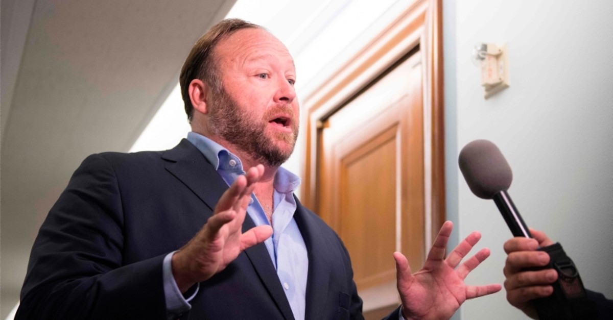 In this file photo taken on Sept. 5, 2018 right-wing conspiracy theorist Alex Jones speaks with reporters. (AFP Photo)