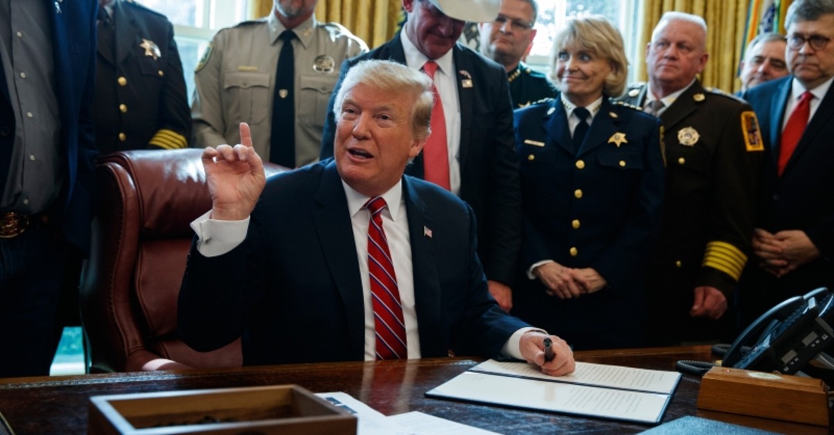 President Donald Trump speaks about border security in the Oval Office of the White House, Friday, March 15, 2019, in Washington. (AP Photo)