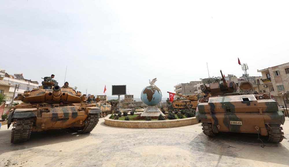 Turkish soldiers gather in the city of Afrin in northwestern Syria after taking control over it from the YPG in cooperation with the Free Syrian Army.