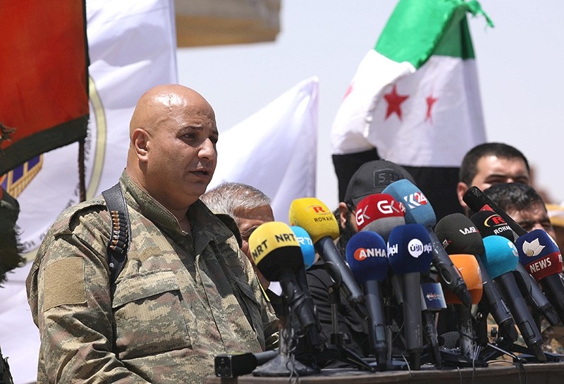 SDF spokesman Talal Sillo speaks during a press conference in Hukoumiya village in Raqqa, Syria, on June 6, 2017. (Reuters Photo)