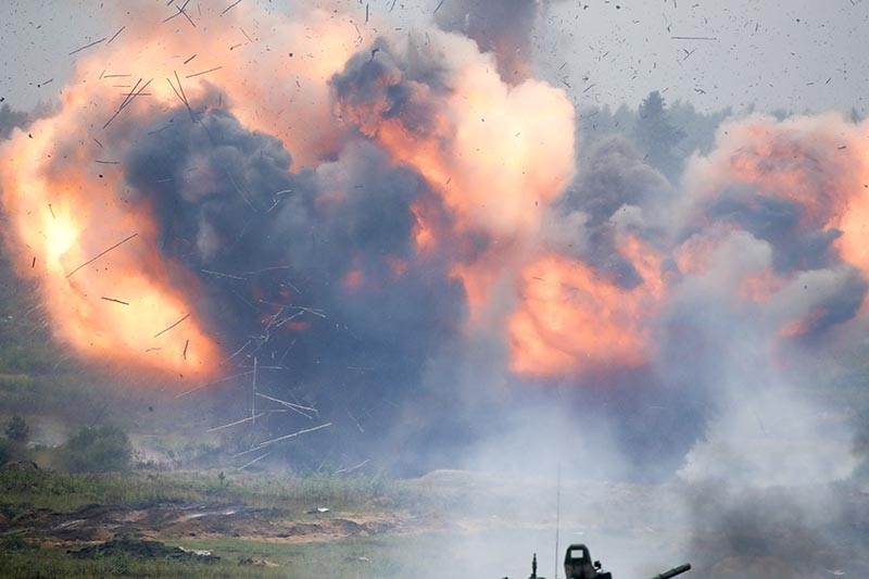 Shells explode during the Zapad (West) 2017 Russia-Belarus military exercises at the Borisovsky range in Borisov, Belarus, Wednesday, Sept. 20, 2017. (AP Photo)