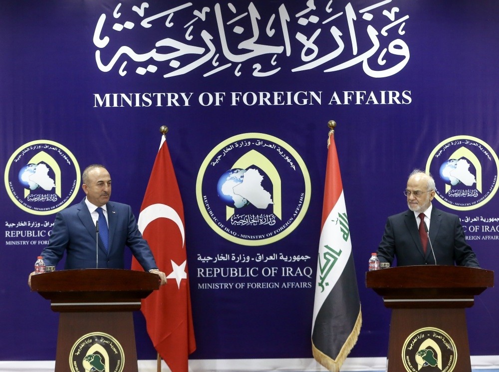 Foreign Minister Mevlu00fct u00c7avuu015fou011flu (L) during a press conference with Iraqi Foreign Minister Ibrahim al-Jaafari in Baghdad, Aug. 23. 