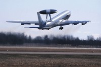 A NATO Airborne Warning and Control System (AWACS) aircraft take off during the Lithuanian - NATO air force exercise at the Siauliai Air Base some 230 kilometers east of the capital, Vilnius, Lithuania, April 1, 2014. 