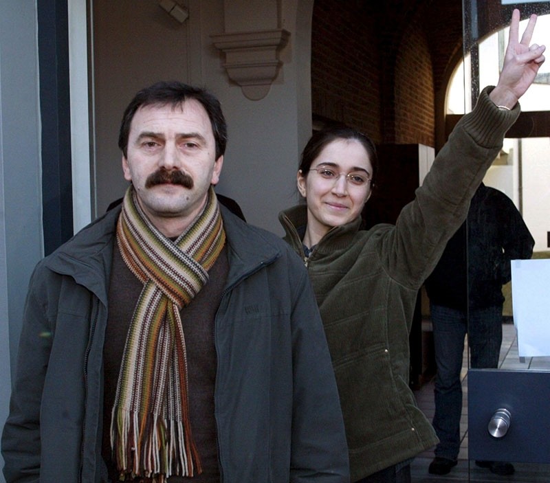 This file photo dated Jan. 27, 2006 shows Musa Au015fou011flu (L) walking next to Fehriye Erdal, a DHKP-C militant who took part in the notorious 1996 Sabancu0131 murder, while leaving the courthouse in Belgian city of Brugge.