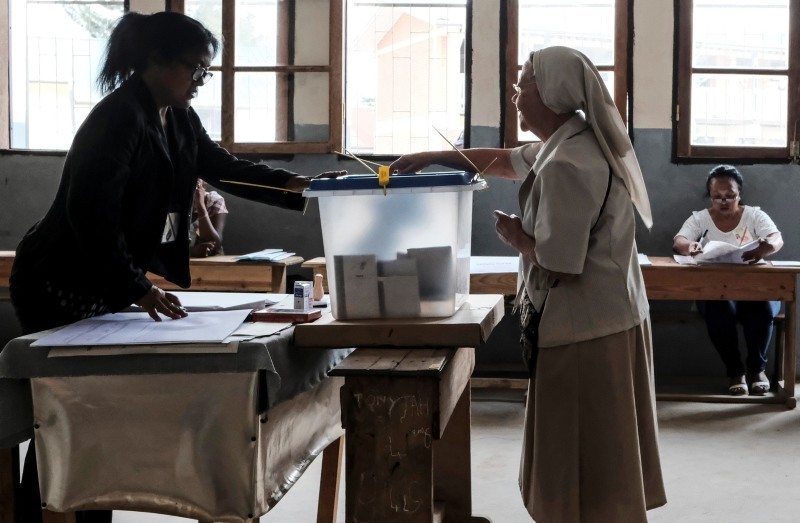 A voter casts her vote at a polling station in Antananarivo, Madagascar, Wednesday, Nov. 7, 2018. (AP Photo)