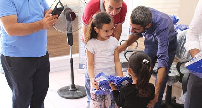 هيئة الإغاثة التركية توزع ملابس على أكثر من 4 آلاف يتيم سوري