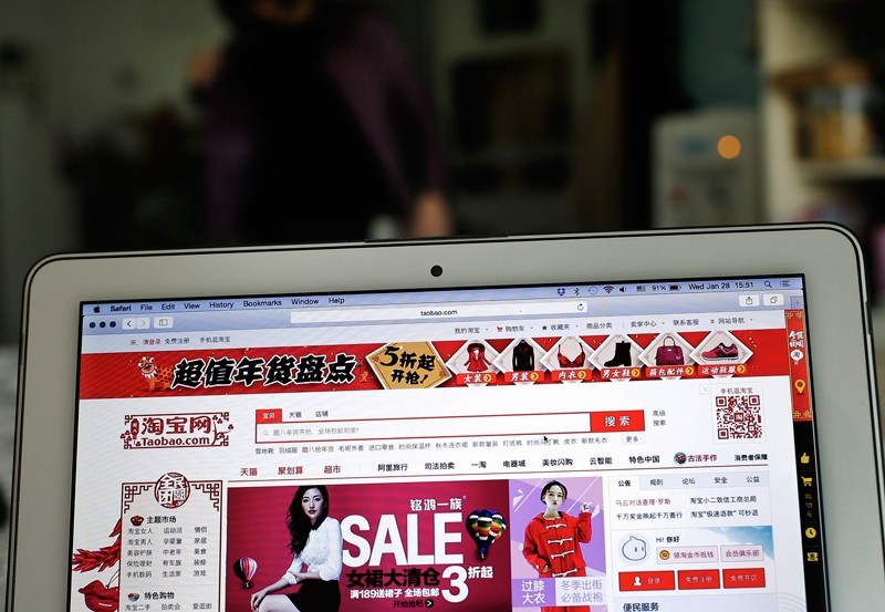A laptop computer screen displaying the website of Alibaba's Taobao main site ( AP Photo)