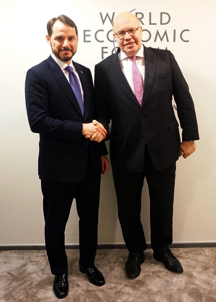 Treasury and Finance Minister Berat Albayrak (L) and Germany's Economy and Energy Minister Peter Altmaier met on the sidelines of the 49th World Economic Forum (WEF) in Davos, Switzerland, Jan. 24, 2019.