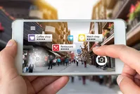 Instead of generating an entirely virtual world accessed by a headset like in virtual reality, AR uses the real world as the background and overlays it with digitally-generated images.