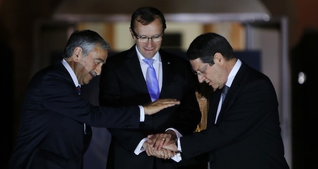 Turkish Cypriot President Mustafa Aku0131ncu0131 (L), UN envoy Espen Barth Eide (C) and Greek Cypriot leader Nicos Anastasiades. (AP Photo)