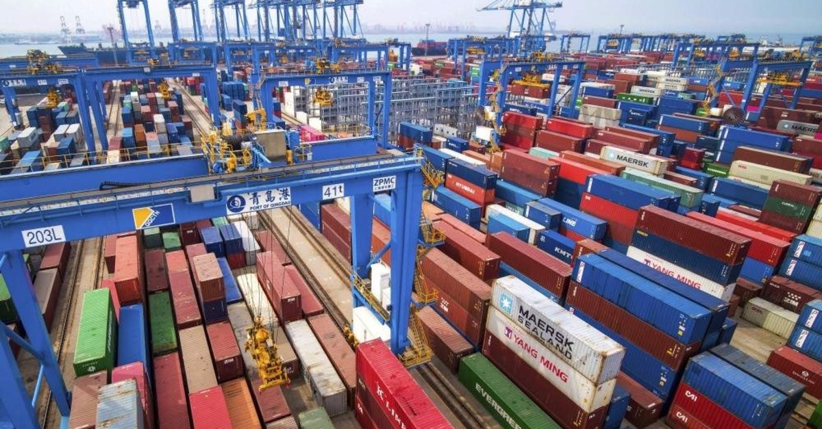 In this May 14, 2019, file photo, containers are piled up at a port in Qingdao in east China's Shandong province. (AP Photo)
