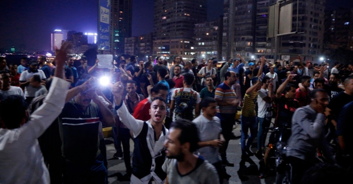 Egyptian protesters shout slogans as they take part in a protest calling for the removal of President Abdel Fattah al-Sisi in Cairo's downtown on Sept. 20, 2019 (AFP Photo)