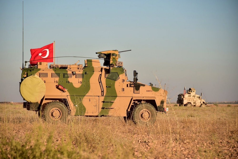 Turkish and U.S. troops participate in a joint patrol around Manbij, northern Syria, Nov. 1, 2018.