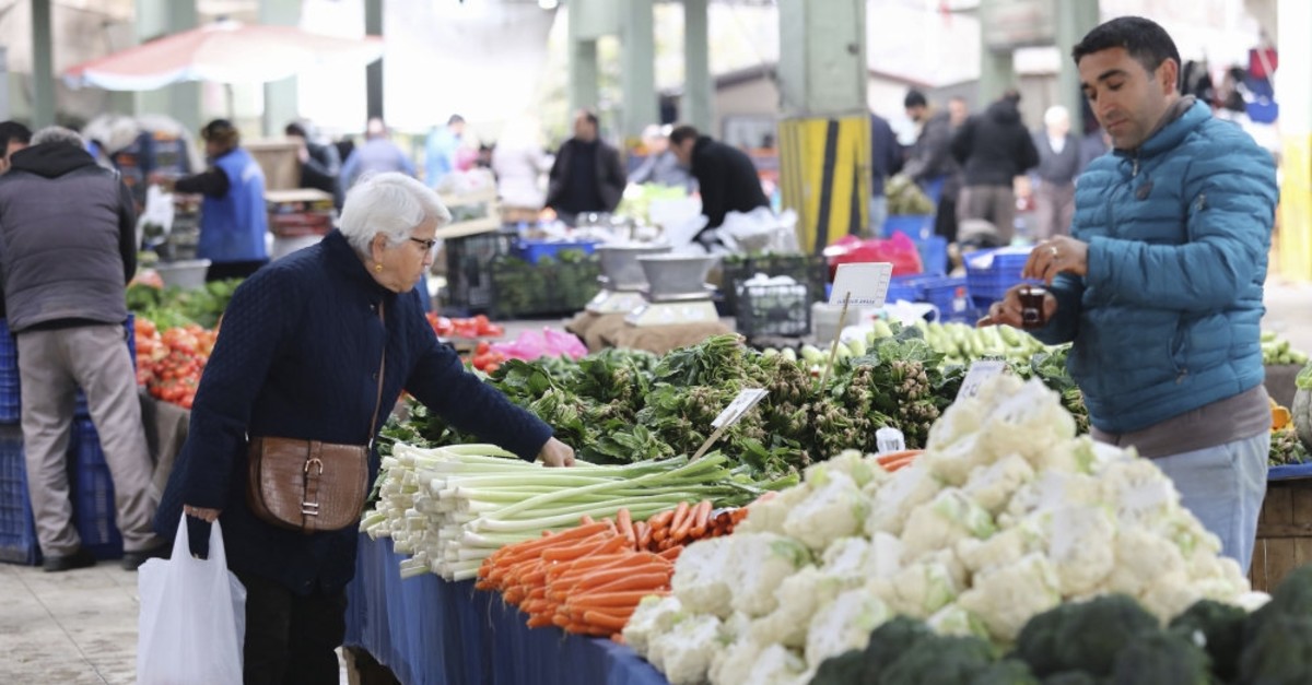A woman shops for vegetables at a market in the capital Ankara, Feb. 13, 2019.