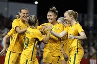 Australia's national team players celebrate during a friendly match between the Australian Matildas and Brazil at McDonald Jones Stadium in Newcastle, Australia, Sept. 19, 2017. (EPA Photo)