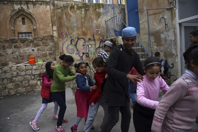 Children play as they attend a circus class.