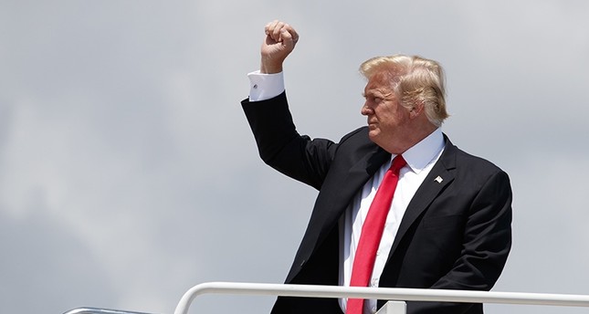 President Donald Trump boards Air Force One, Thursday, July 5, 2018, at Andrews Air Force Base, Md., en route to a rally in Great Falls, Mont. (AP Photo)