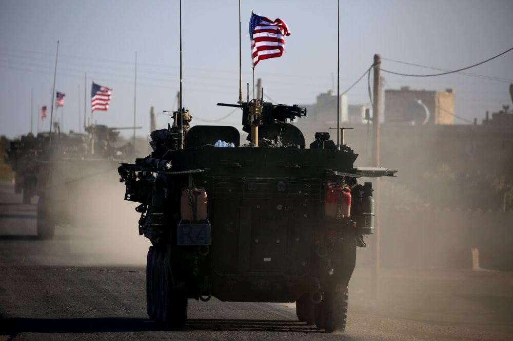 A convoy of U.S. armored vehicles near the village of Yalanli, western Manbij, Syria, March 5, 2017. 