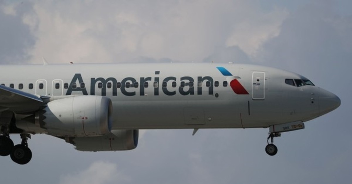 An American Airlines Boeing 737 Max 8, on a flight from Miami to New York City, comes in for landing at LaGuardia Airport in New York, March 12, 2019. (AFP Photo) 