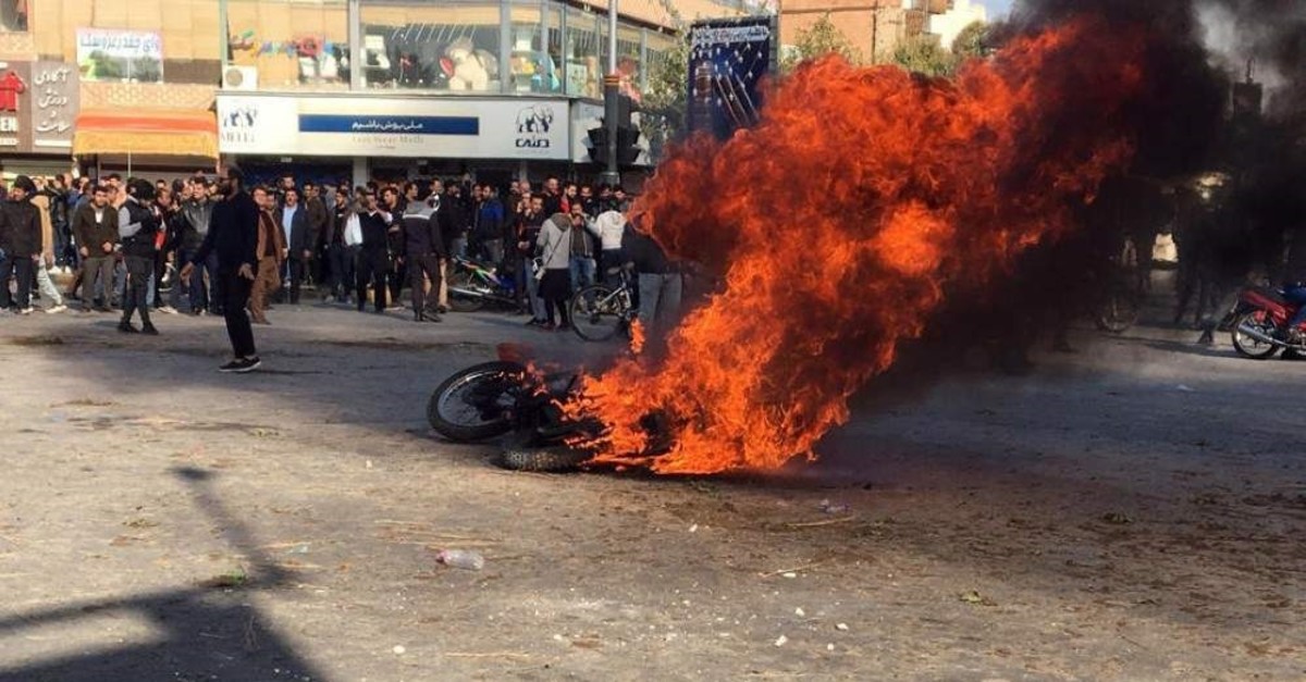 Iranian protesters clash in the streets, Isfahan, Nov. 16, 2019. (EPA Photo)