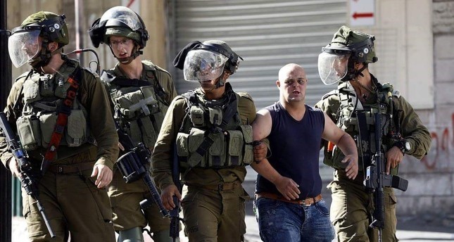 جنود إسرائيليون يعتدون على فلسطيني مصاب بمتلازمة داون