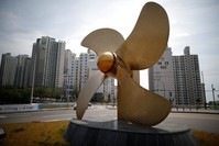 A sculpture of a full-size propeller in front of an apartment complex in Ulsan, South Korea.
