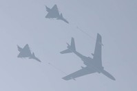 Planes from the Chinese People's Liberation Army air force fly during a rehearsal of the military parade on Oct. 1 to mark the 70th anniversary of the founding of the People's Republic of China, in Beijing, Sept. 22, 2019. (Reuters Photo)