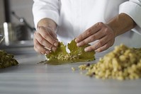The art of sarma is in the rolling of the vine leaves. (iStock Photo)