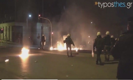 A pro-YPG group throw Molotov cocktails at Greek police outside the Turkish Consulate in Thessaloniki, Greece.