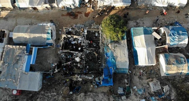 The charred remains of a tent following Syrian regime bombardment on a makeshift camp in the village of Qah near the Turkish border in Idlib, Nov. 21, 2019.  (AFP)