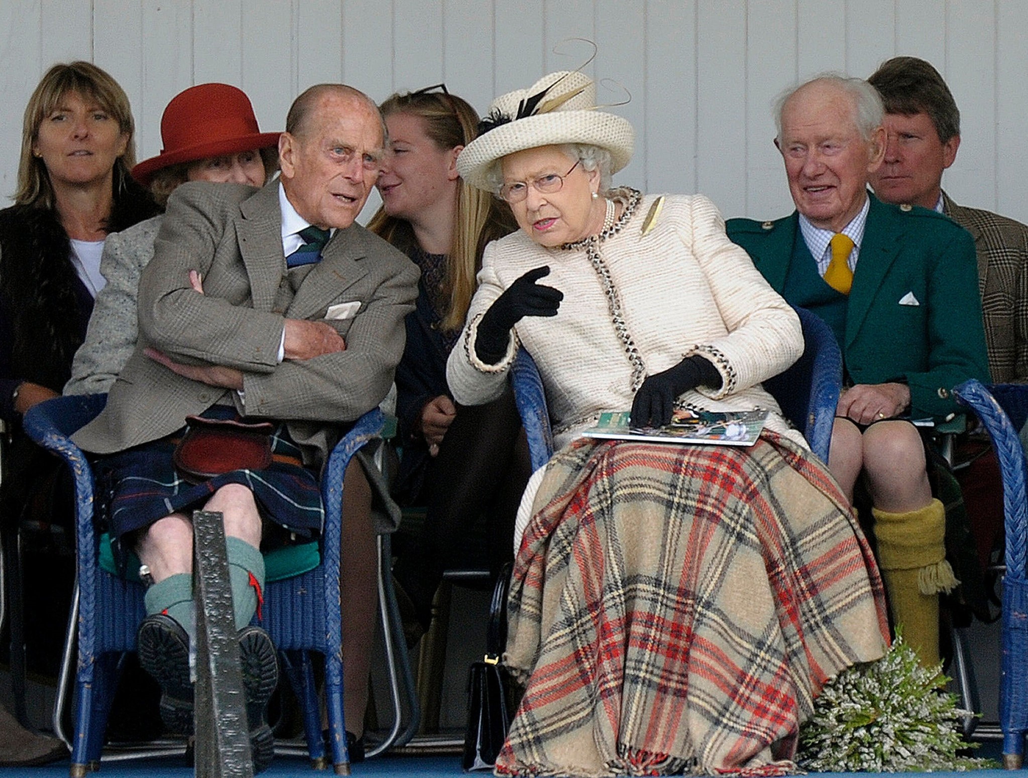 This file photo taken on September 06, 2014 shows Britain's Queen Elizabeth II and her husband Prince Philip (L) attending the Braemar Gathering in Braemar, central Scotland. (AFP Photo)