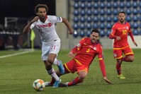 Turkey's Naz?m Sangare fights for the ball with Andorra's Marc Vales during the Euro 2020 qualifier match, Nov. 17, 2019. (AFP)