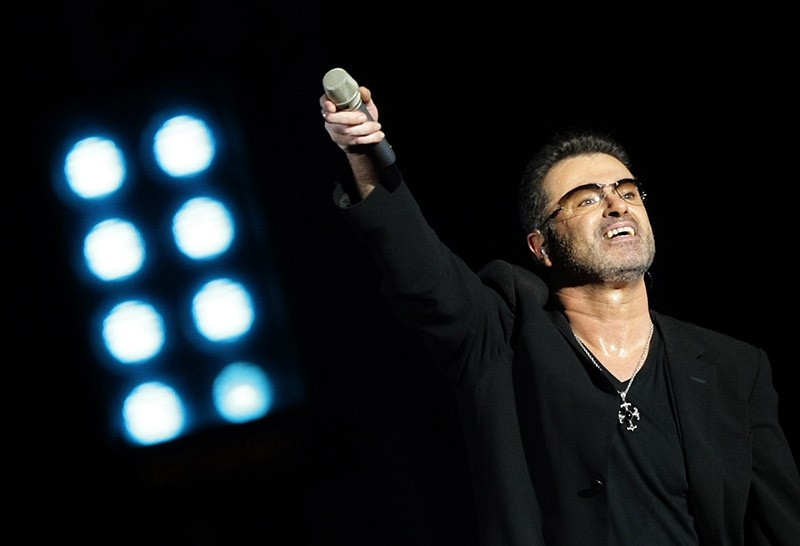 This file photo taken on December 01, 2008 shows legendary pop singer George Michael performing in concert at the Zayed Sports City stadium in Abu Dhabi on December 1, 2008. (AFP Photo)