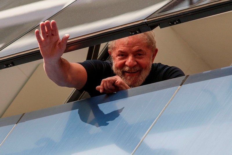 Brazilian former president Luiz Inacio Lula da Silva waves from a window of the Metallurgical Union, in Sao Bernardo do Campo, Sao Paulo state, Brazil, on April 07, 2018. (AFP Photo)
