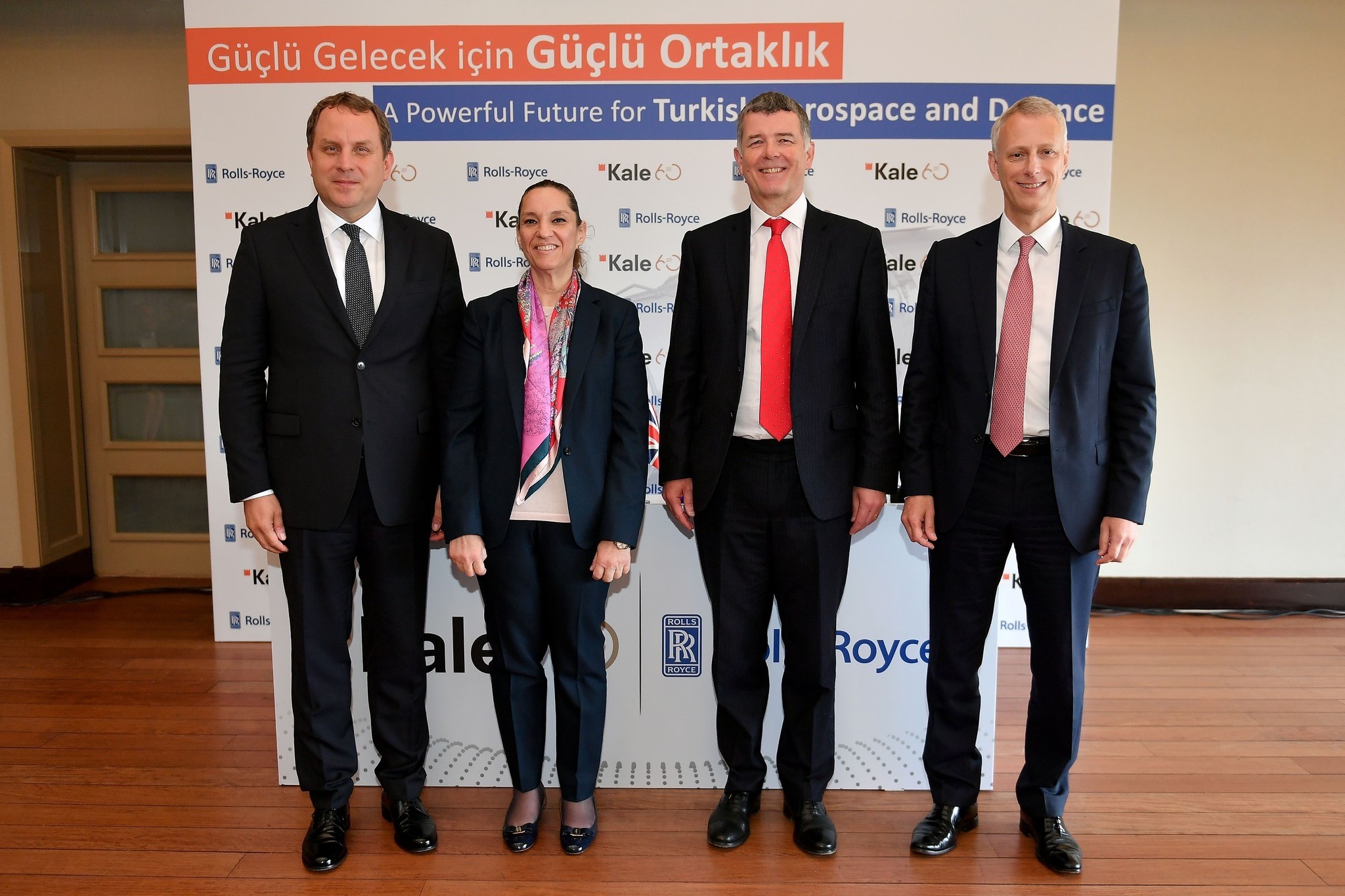 Kale Group Vice President Osman Okyay (L), Kale Group President Zeynep Bodur Okyay, UK's Ambassador to Turkey Richard Moore and Rolls-Royce Defense Aviation Unit President Chris Cholerton pose for a picture during the press conference.