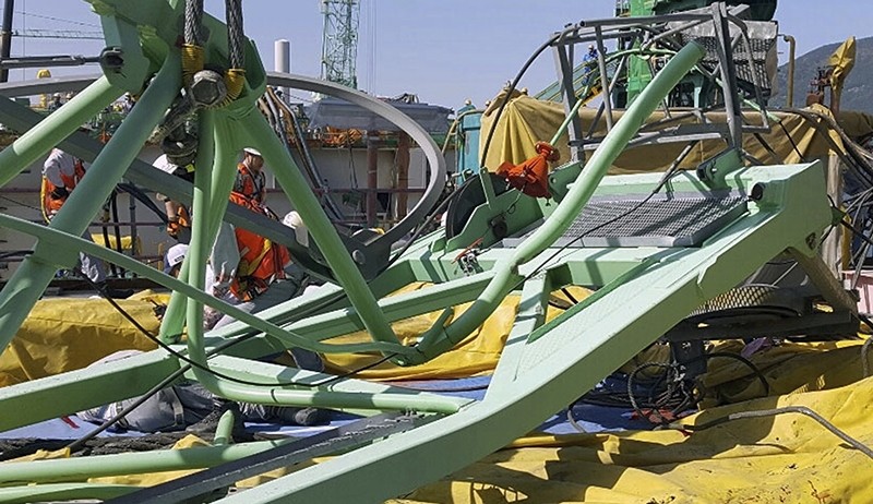  A part of a collapsed crane is seen fallen on the ground at Samsung Heavy Industries' shipyard on Geoje Island, South Korea, Monday, May 1, 2017. (AP Photo) 