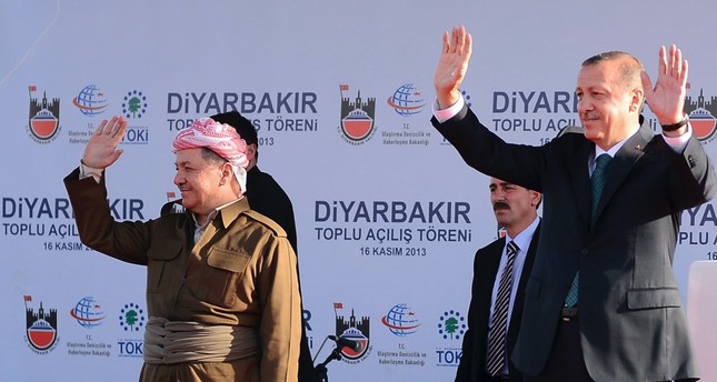 President Recep Tayyip Erdoğan and President Masoud Barzani of the Iraqi Kurdistan Regional Government (KRG), greet the crowd during an opening in Diyarbakır on Nov. 16, 2013.