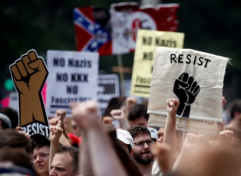 People gather at Freedom Plaza to protest the white supremacist Unite the Right rally held in front of the White House on the 1-year anniversary of the rally in Charlottesville, VA, in downtown Washington, U.S., Aug. 12, 2018. (Reuters Photo)