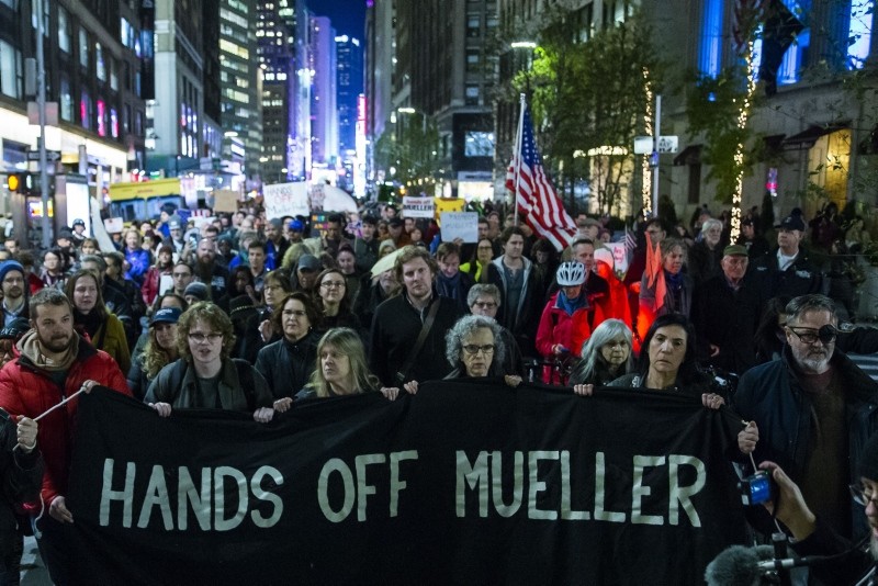 People march through Times Square during a protest the day after President Donald Trump forced the resignation of Attorney General Jeff Sessions on November 8, 2018 in New York City. (AFP Photo)