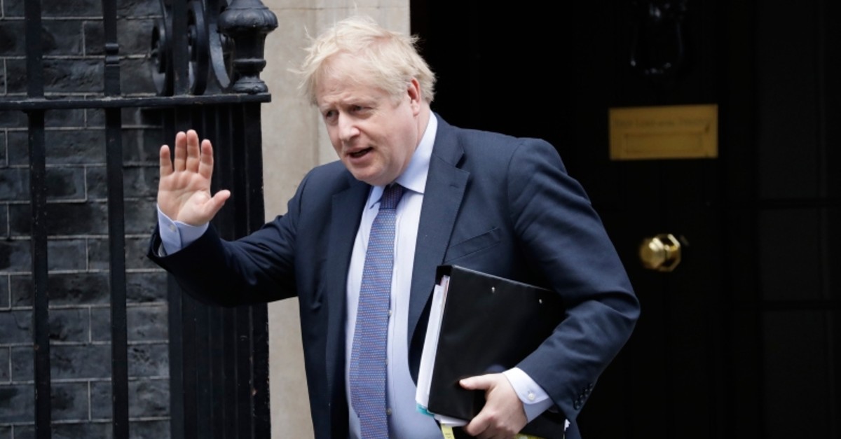 In this file photo dated Wednesday, Feb. 12, 2020, British Prime Minister Boris Johnson waves at the media as he leaves 10 Downing Street in London (AP File Photo)