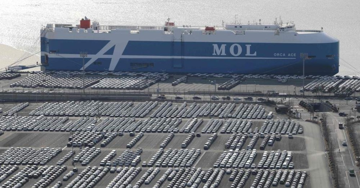 This Feb. 6, 2020, photo shows rows of Hyundai cars parked for shipping in the southeastern port of Ulsan, South Korea. (Yonhap via AFP)