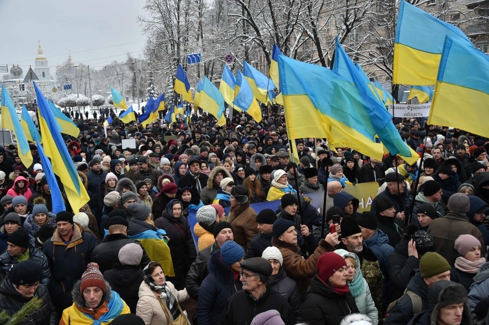 Ukrainians take part in a rally outside of St. Sophia Cathedral ahead of a historic synod expected to establish an Orthodox church independent from Russia, in Kiev, Dec. 15.