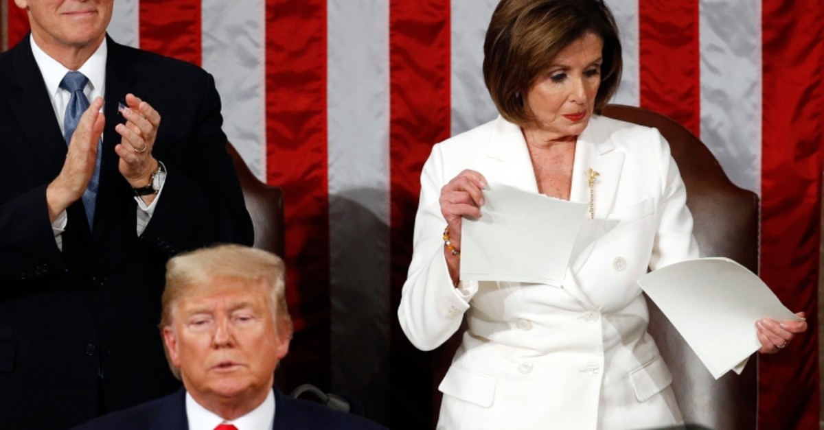 House Speaker Nancy Pelosi of Calif., tears her copy of President Donald Trump's s State of the Union address after he delivered it to a joint session of Congress on Capitol Hill in Washington, Tuesday, Feb. 4, 2020. (AP Photo)