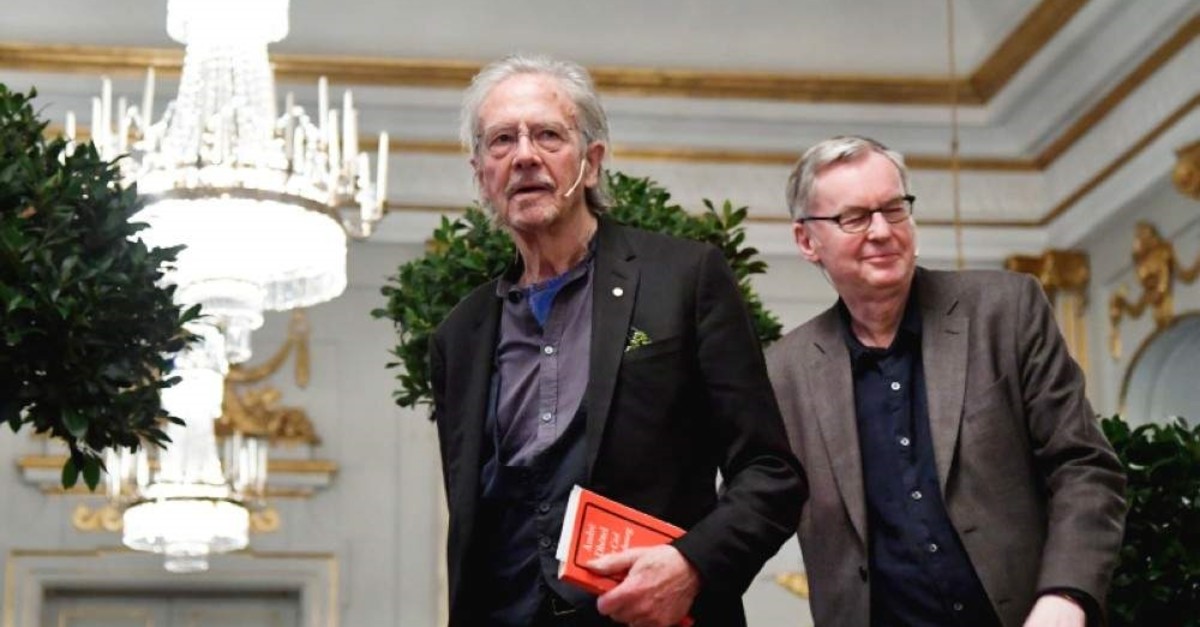 Peter Handke speaks at a press conference at the Swedish Academy in Stockholm, Friday, Dec. 6, 2019. (TT News Agency via AP)