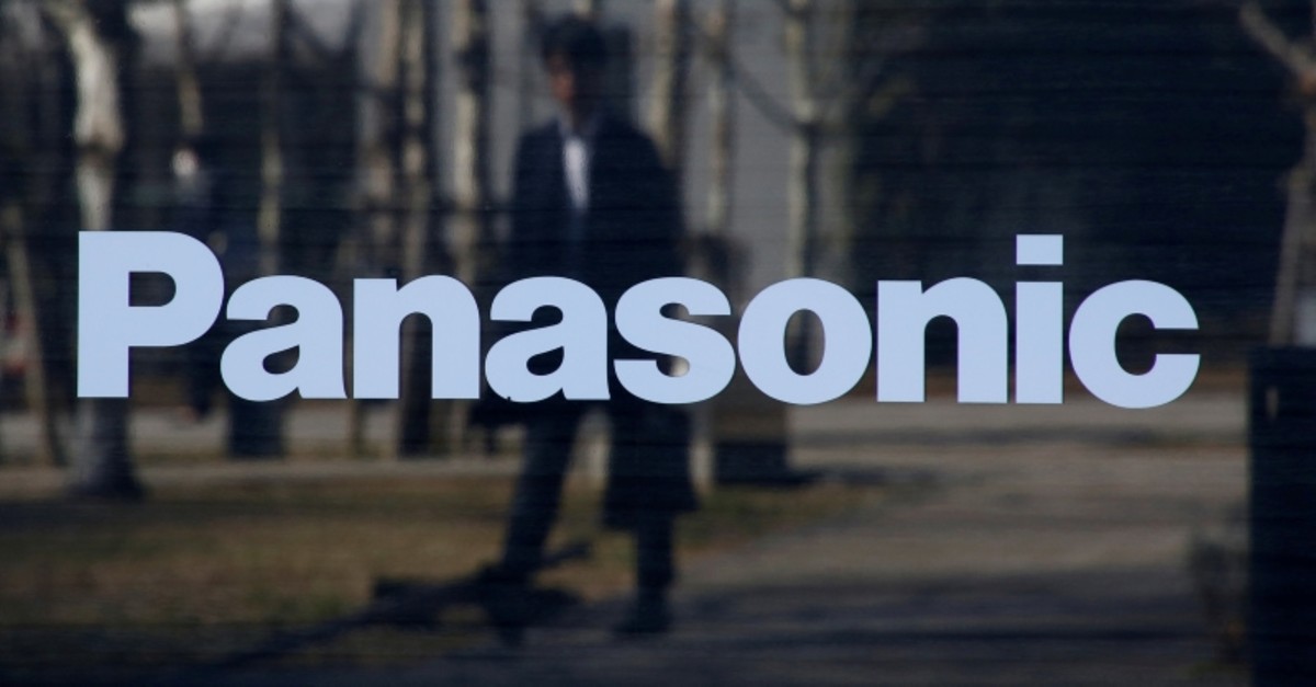 A man is reflected on Panasonic Corp's logo at Panasonic Center in Tokyo, Japan, February 2, 2017. (Reuters Photo)