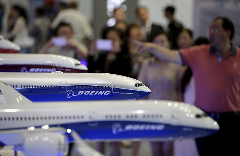 Visitors look at models of Boeing aircrafts at the Aviation Expo China 2015, in Beijing, China, in this September 16, 2015 file photo. (Reuters Photo)