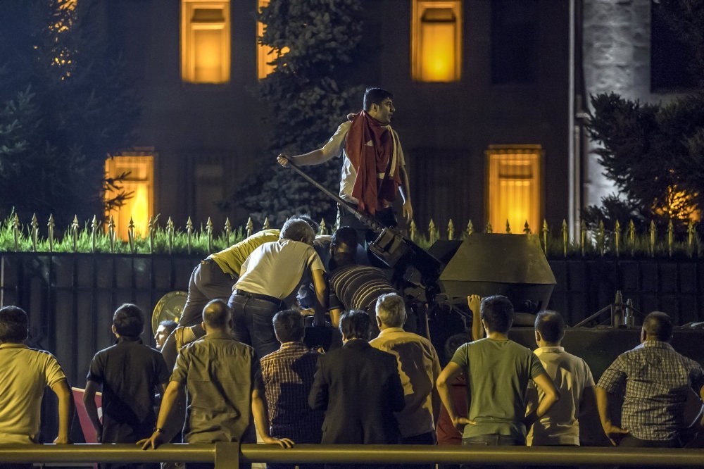People confront putschist troops commanding tanks outside Office of Chief of General Staff on Jul.15, 2016. The coup attempt was foiled thanks to a strong public resistance. 