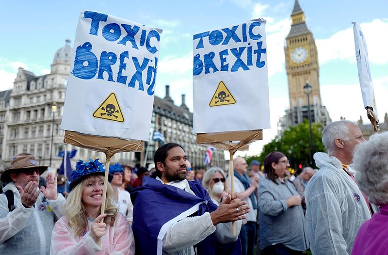 Demonstrators react in Parliament Square during the anti-Brexit 'People's March for Europe', in central London, Britain September 9, 2017. (Reuters Photo)