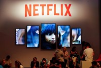 Gamers and visitors rest at the booth of Netflix during Europe's leading digital games fair Gamescom, Cologne, Germany, Aug. 21, 2019. (Reuters Photo)