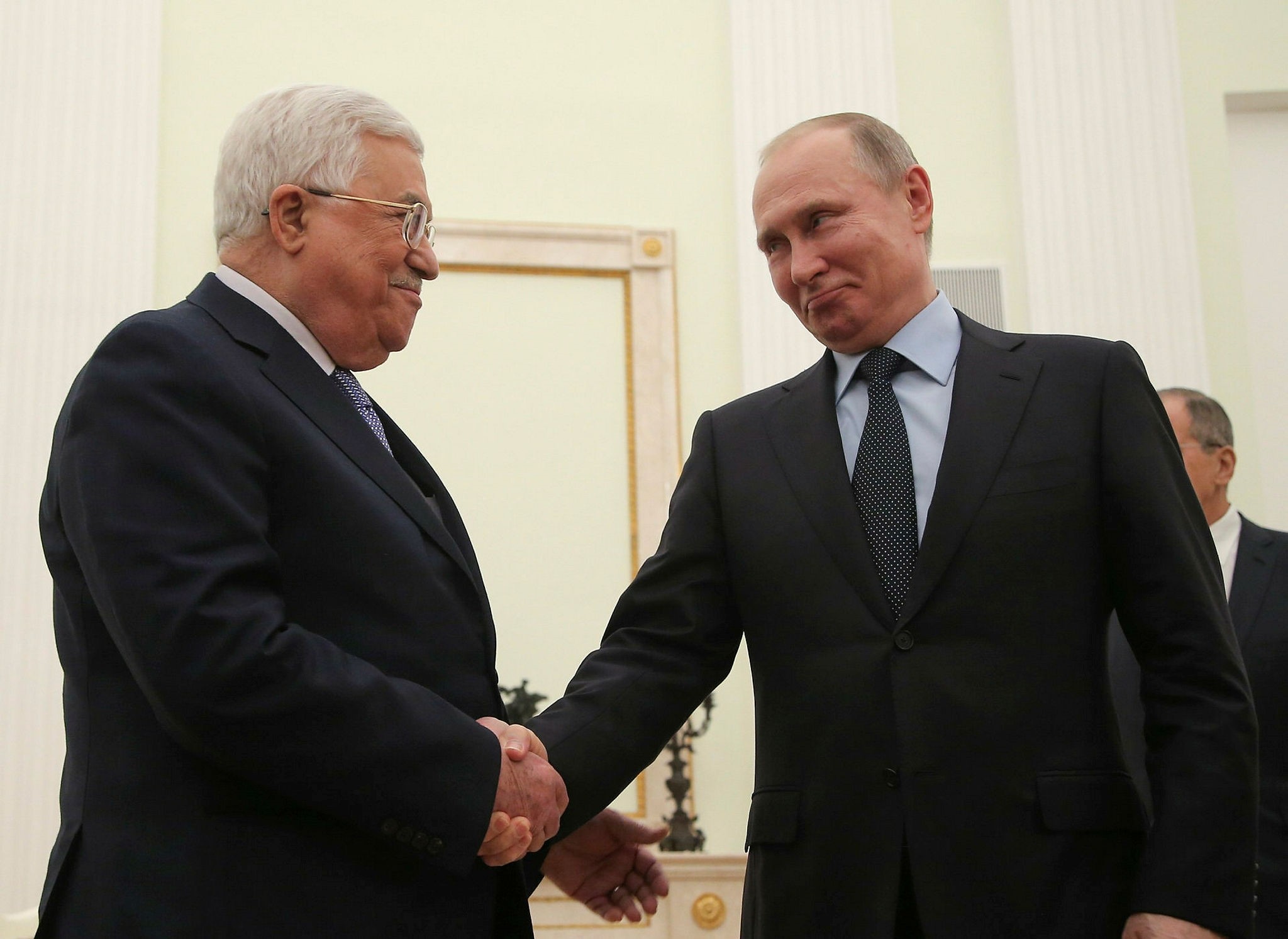 Russian President Vladimir Putin (R) shakes hands with Palestinian President Mahmoud Abbas during a meeting at the Kremlin in Moscow, Russia February 12, 2018. (Reuters Photo)